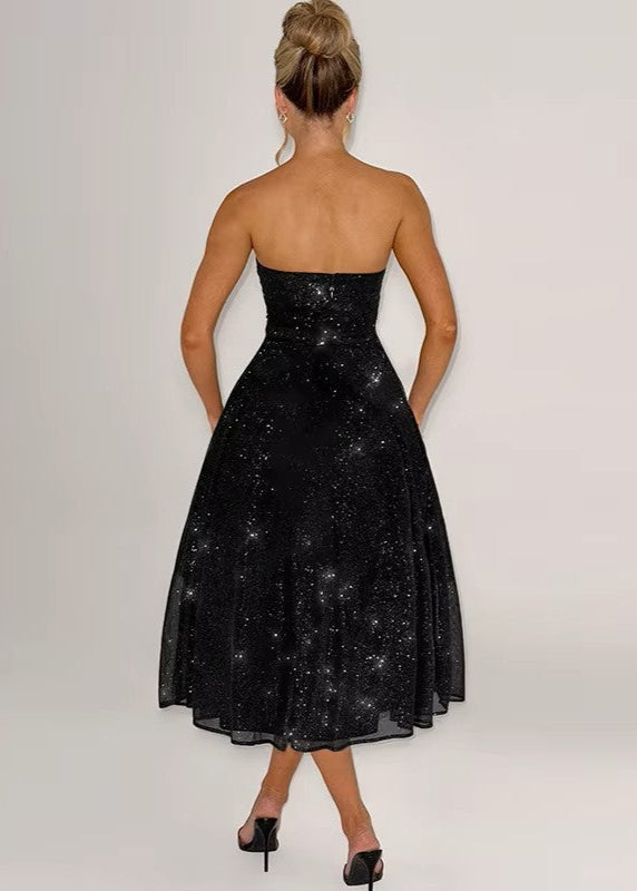 PARIS · VESTIDO MIDI NEGRO BRILLANTE CON ESCOTE RECTO Y LAZO EN LA ESPALDA
