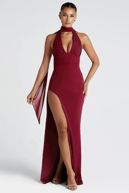 VITTORIA · VESTIDO LARGO CON ESCOTE HALTER Y ABERTURA LATERAL