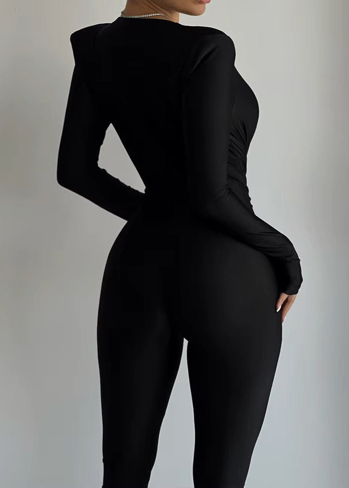 SILVANNA · MONO LARGO NEGRO CON ESCOTE EN PICO Y DETALLE EN LA CINTURA