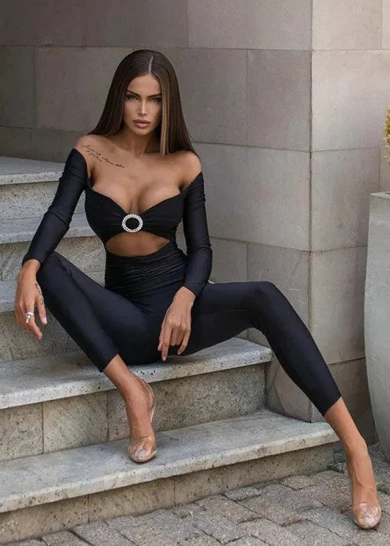 KALI · MONO LARGO DE MANGA LARGA CON HOMBROS CAÍDOS Y ESCOTE PRONUNCIADO