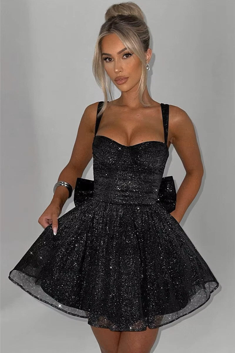 STELLA · VESTIDO MINI BRILLANTE CON LAZO EN LA ESPALDA